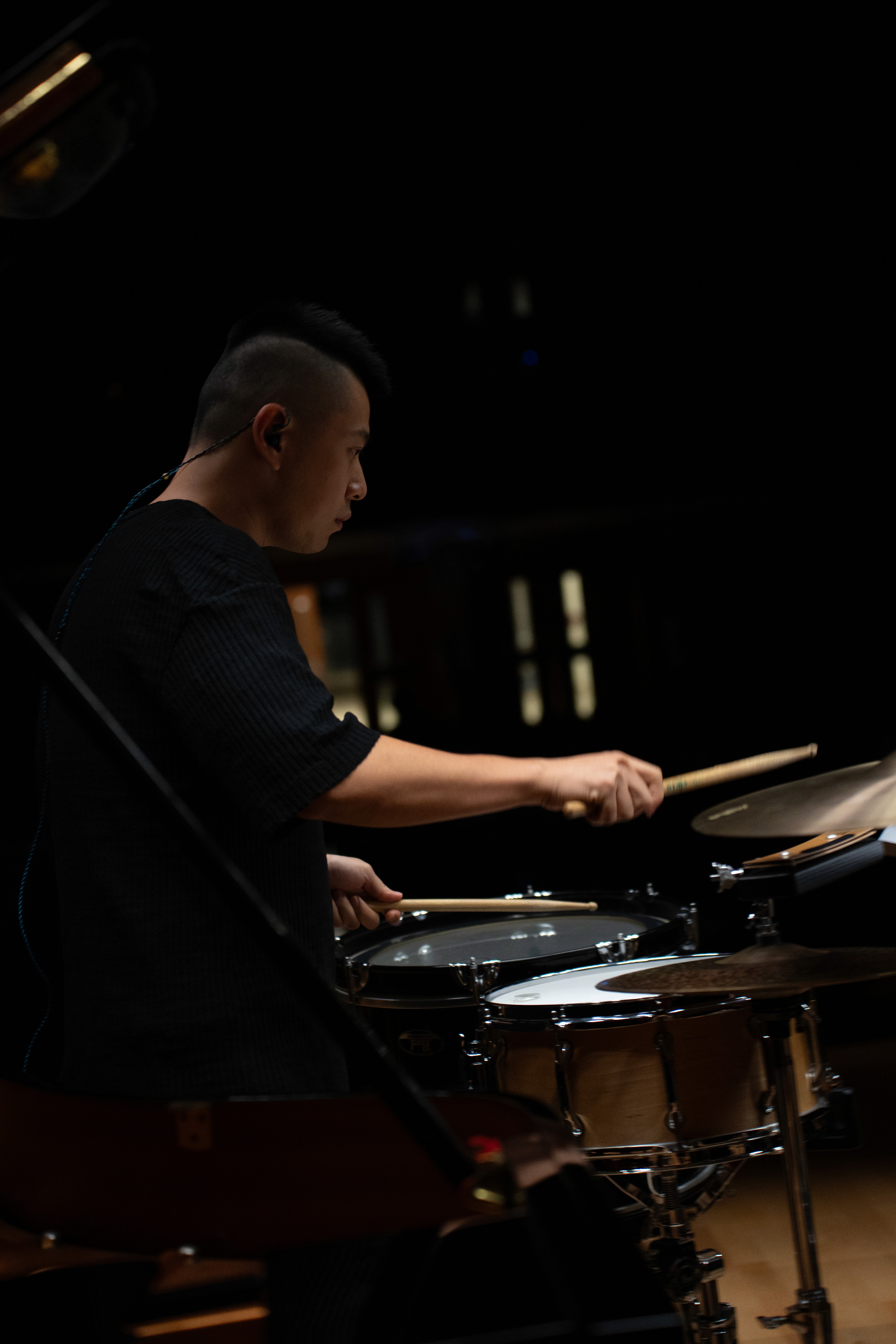 close up of the sister wearing her brother's jacket