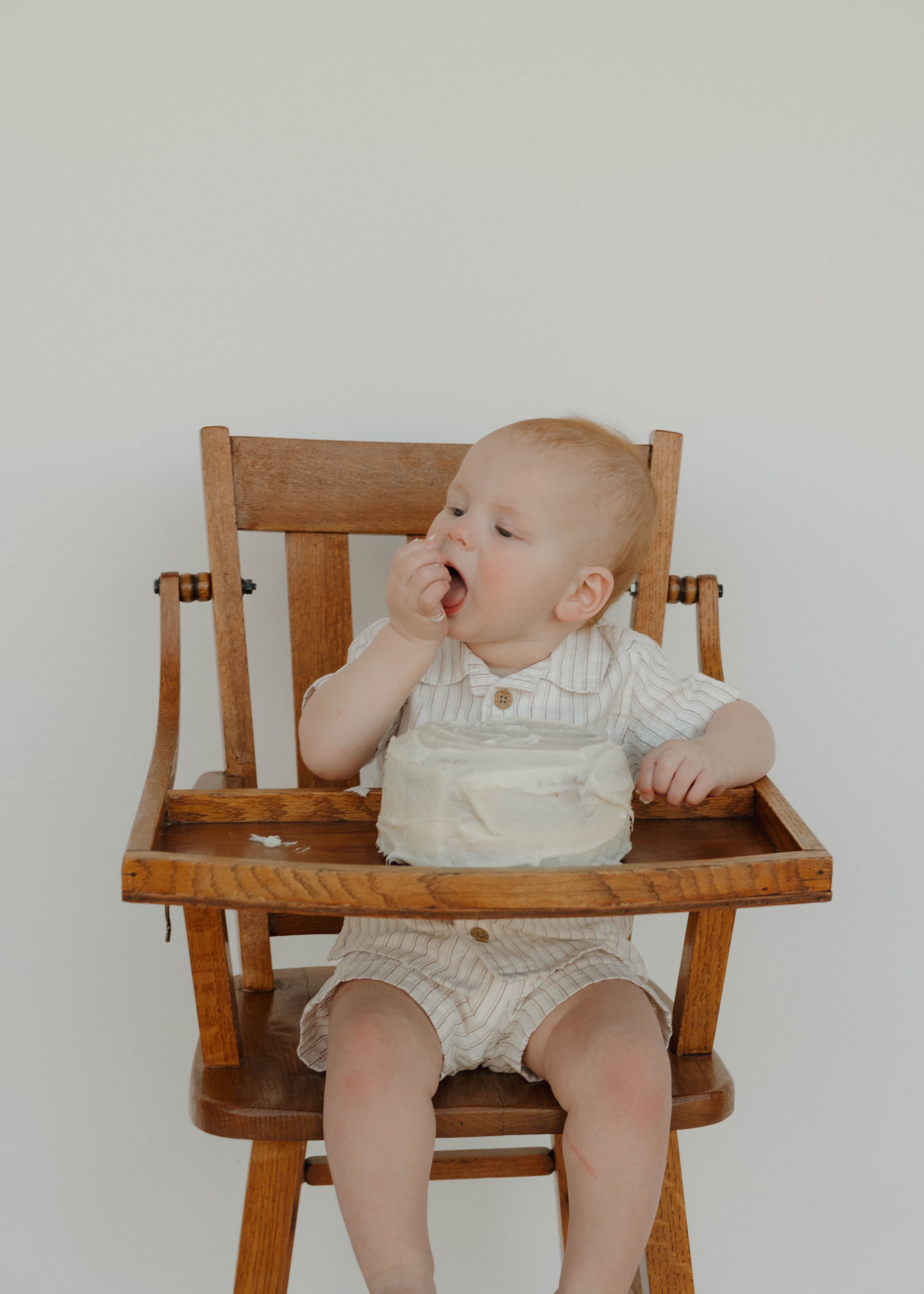 Copper and Coal Photos and her child behind the scenes of a motherhood photoshoot in Gilbert, AZ