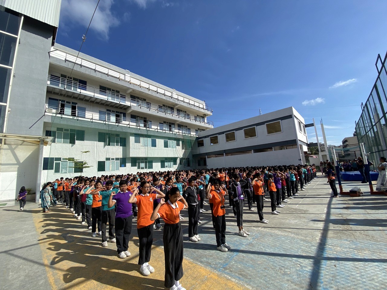 National Centre for Excellence – best CBSE school in Indiranagar – students lined up for the morning assembly on campus