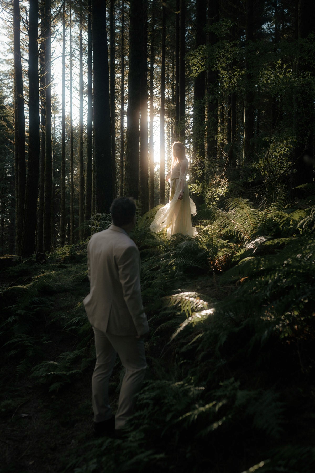fairy moment elopement couple in forest with magical light