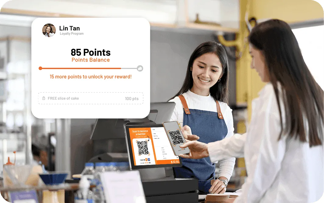 A café customer scanning a QR code at StoreHub POS to check membership points and redeem rewards.
