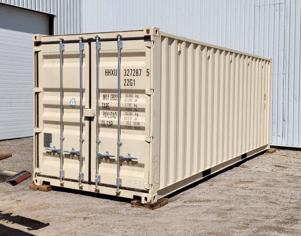 20' New Beige shipping container on wood blocks
