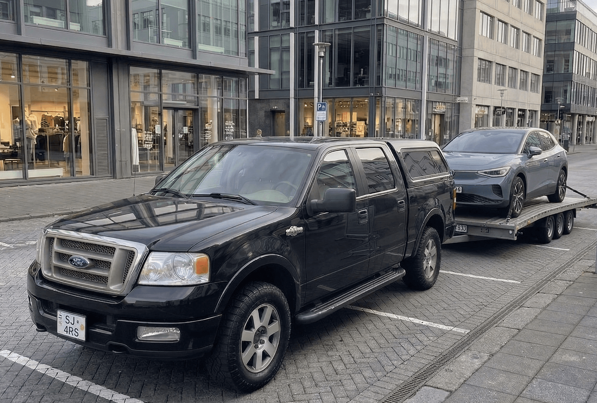 a man working on a tire in a garage