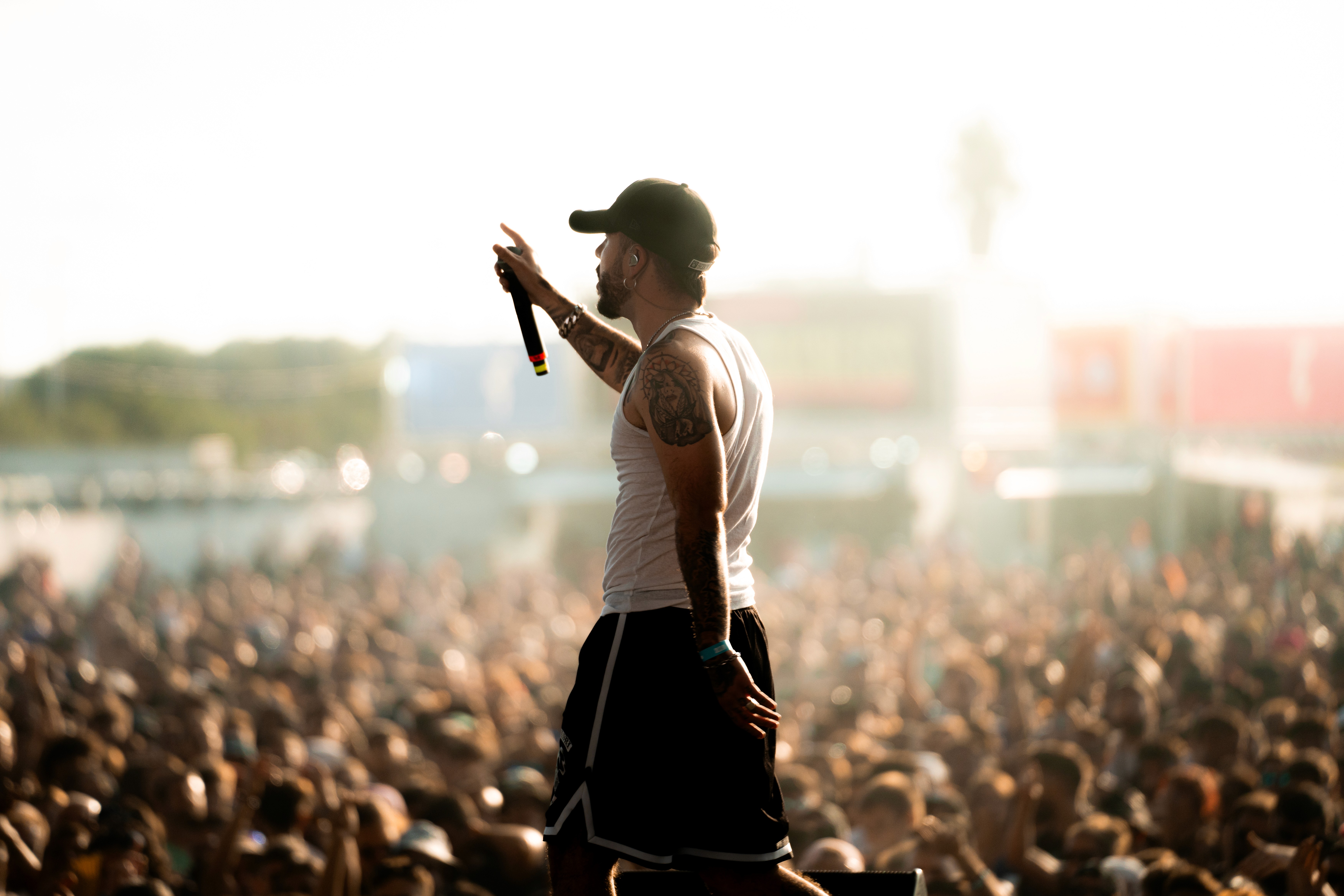 A man wearing a virtual reality headset, immersed in a digital experience, with a focused expression on her face.