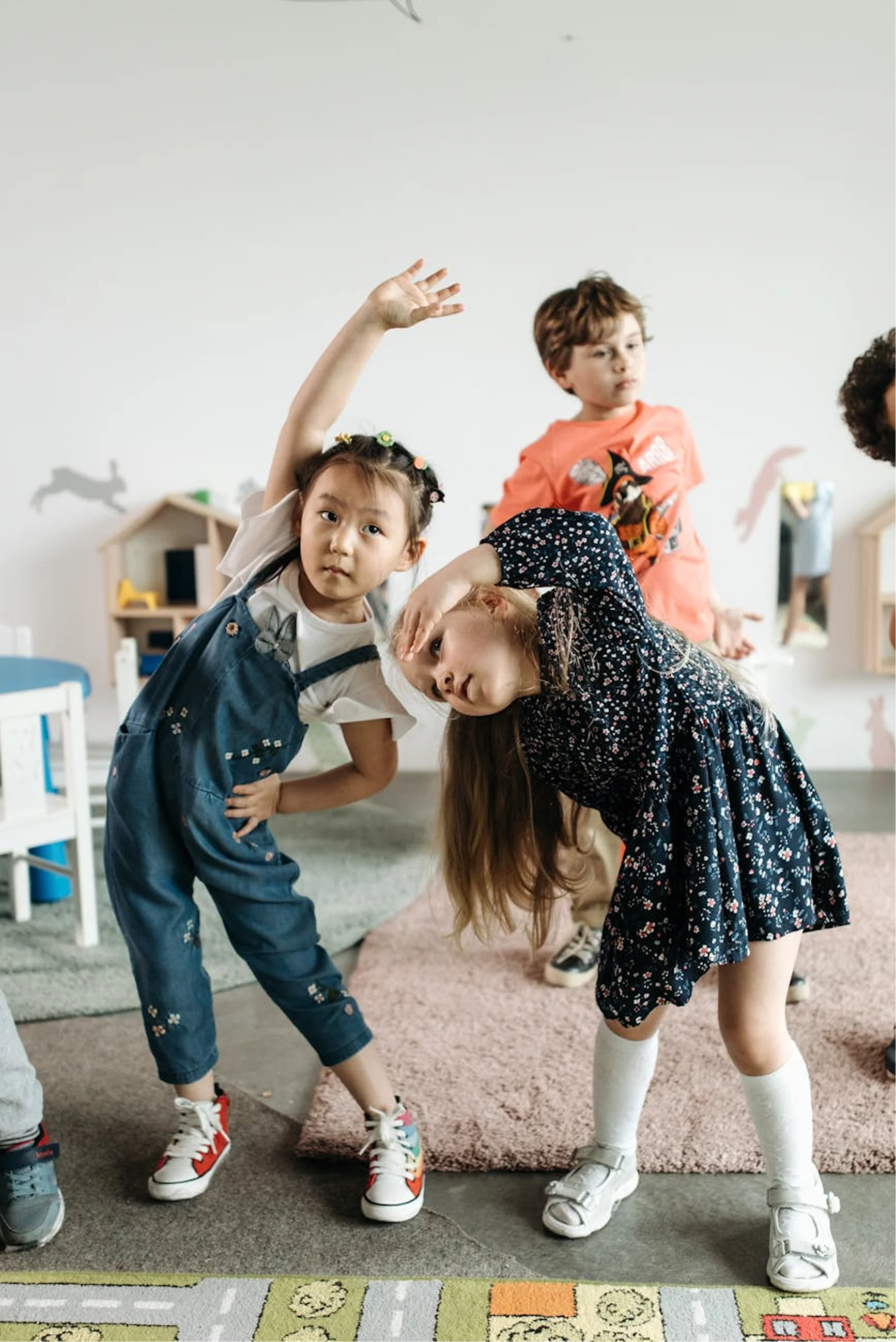 Young preschool children enjoying movement and play in a classroom.an preschool environment designed for toddlers aged 6 months to 5 years