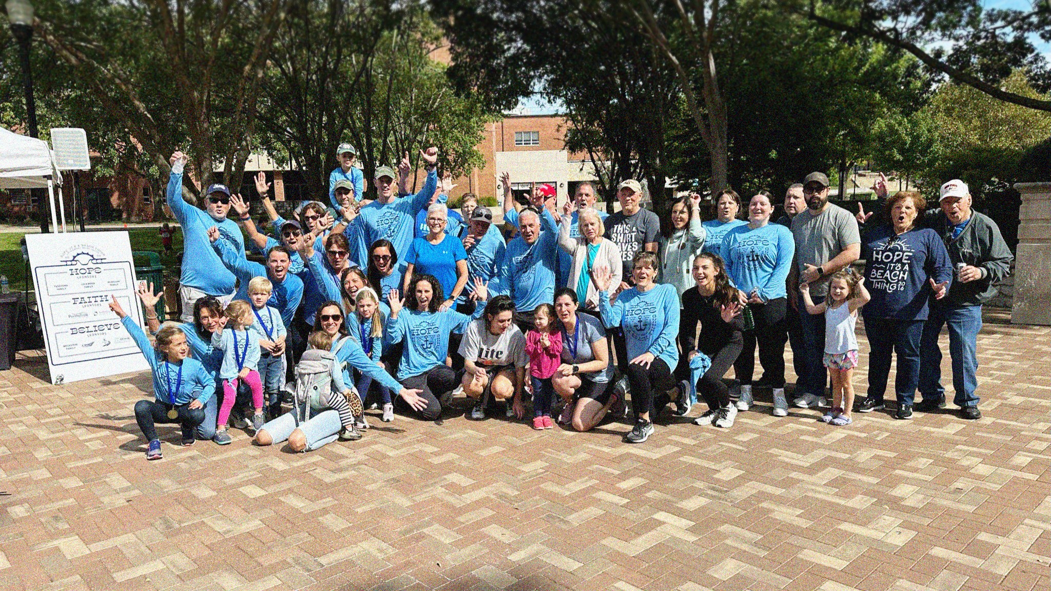 Group photo of 'HOPE IT'S A BEACH THING' 5K fundraiser event.