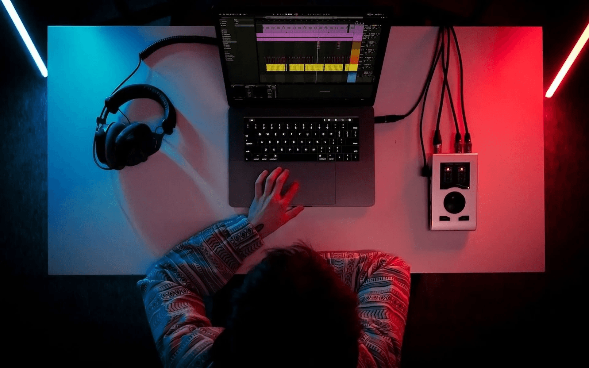 Person editing audio on their laptop - How Long Does A Document Review Take