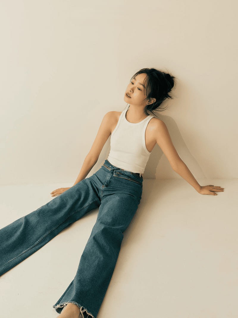 Portrait leaning against wall photography by Lefty Studio