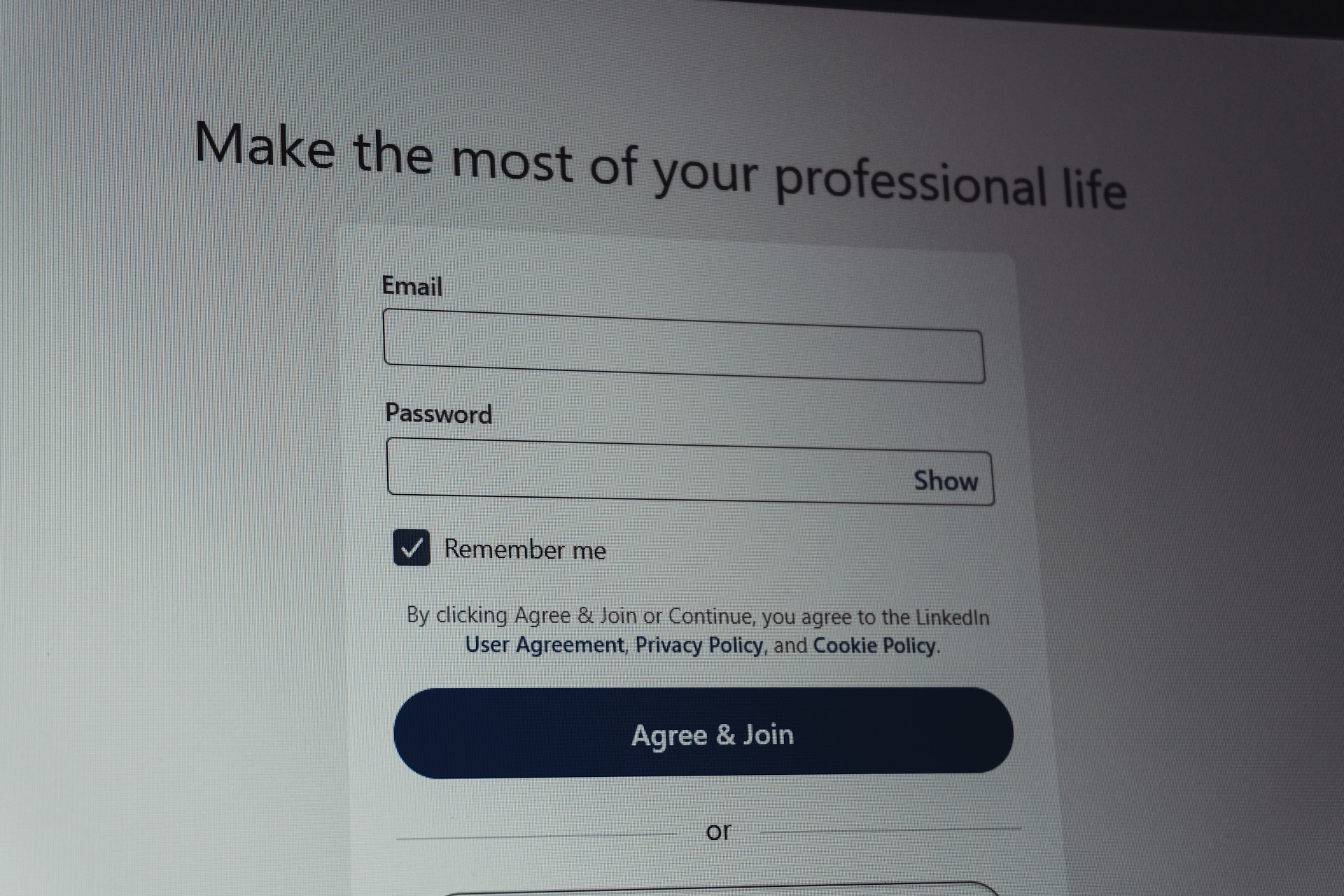 Two palm trees against a clear blue sky