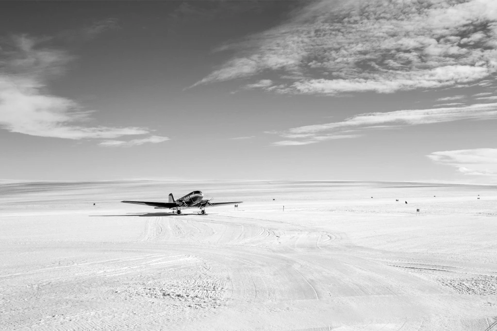 A private jet flying through a clear sky