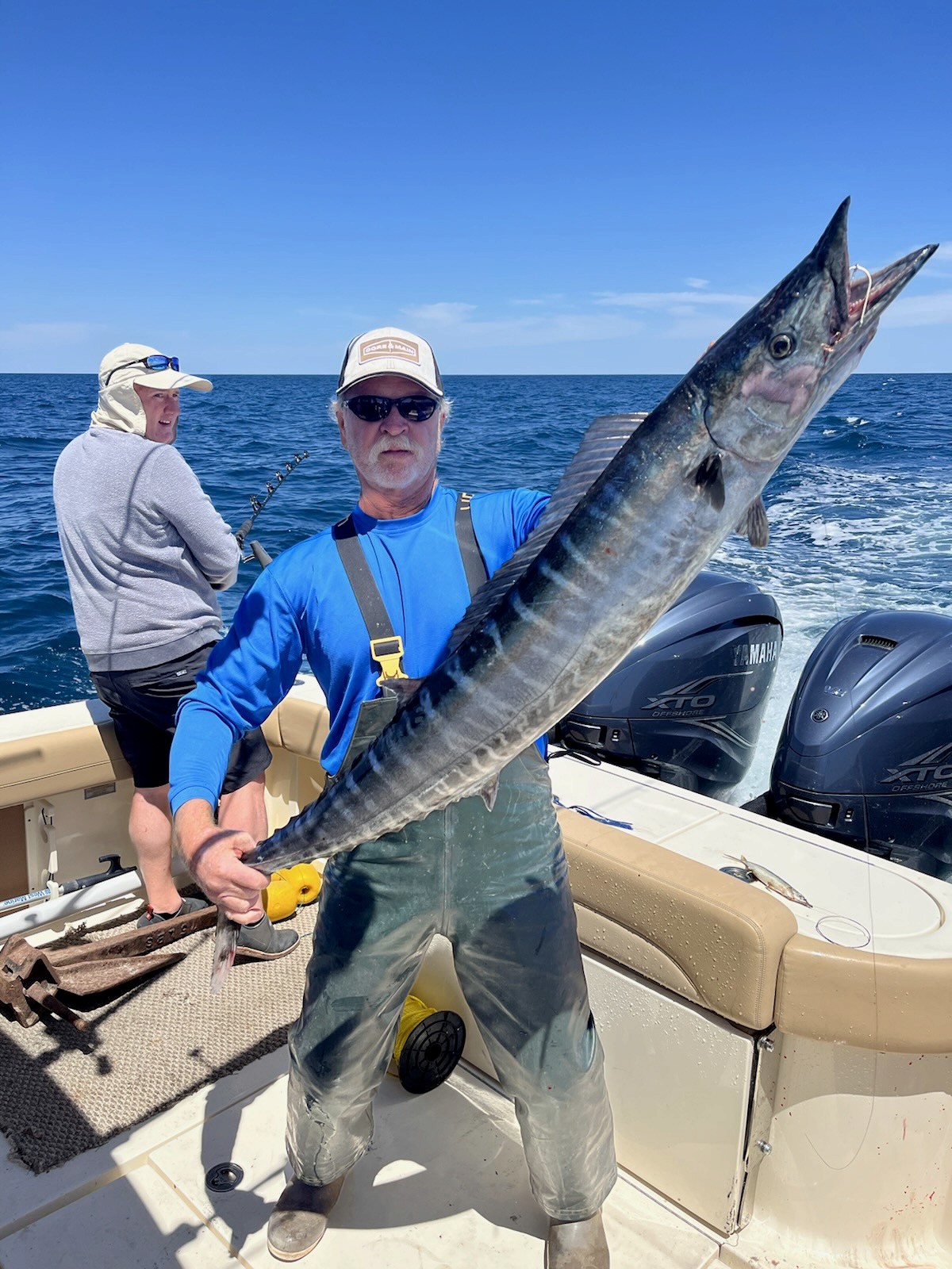 Man holding big Wahoo