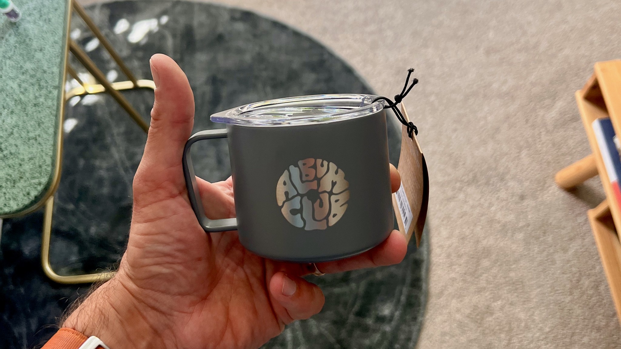 Photo of grey Album Club branded mug