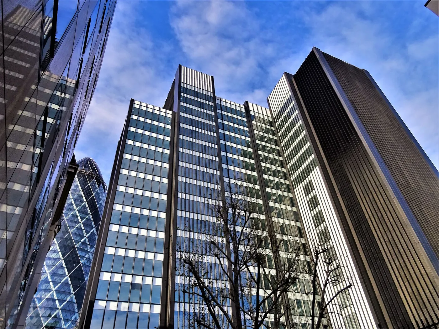 Glass towers of the City of London seen from street level