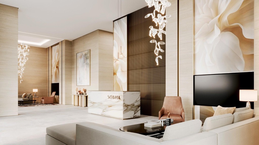 A modern living room featuring a large painting on the wall, showcasing The Mirage at Sobha Central's elegant design.