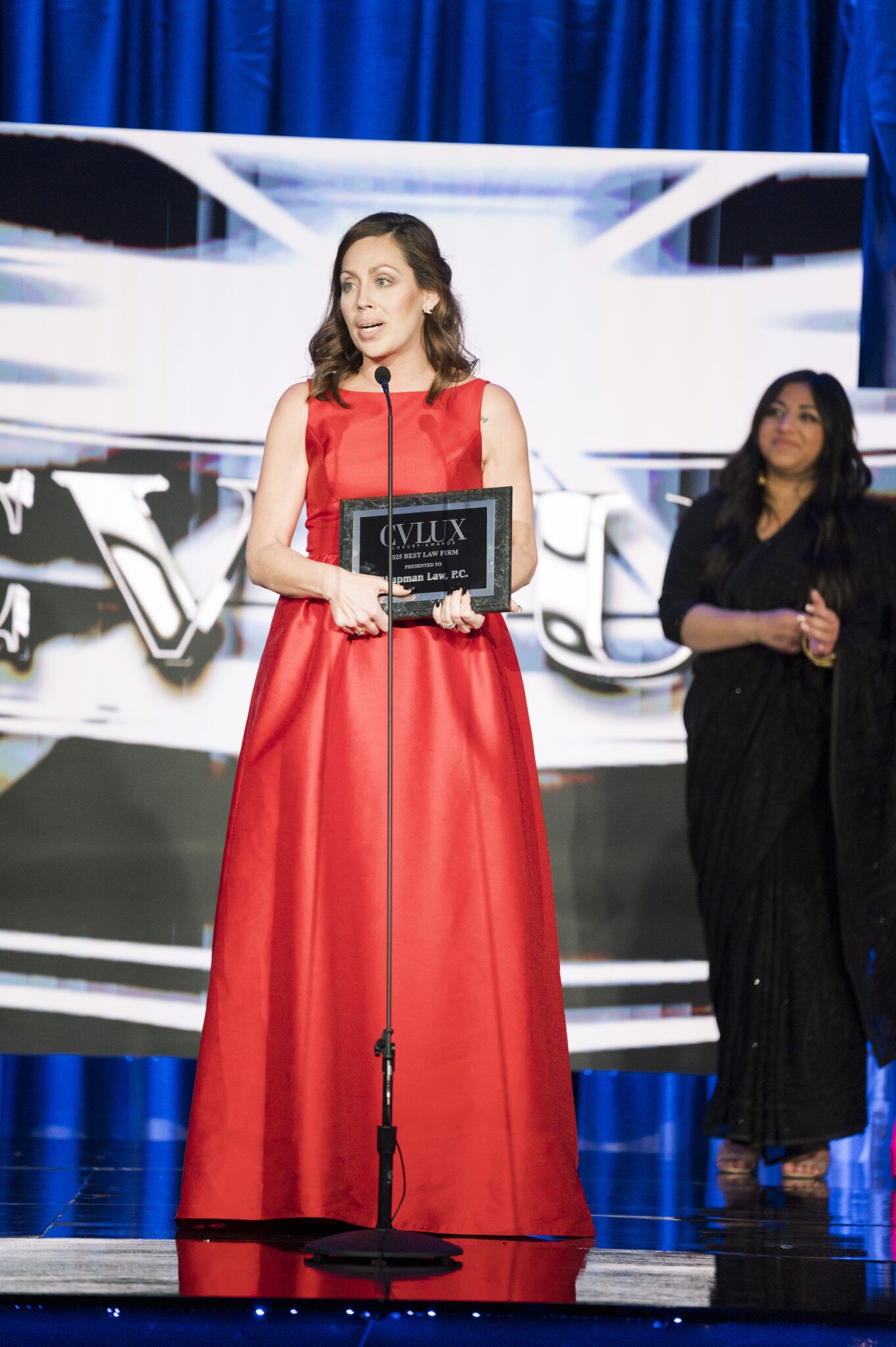 Andrea Chapman, Founding Partner, accepting the award for “Best Law Firm.”