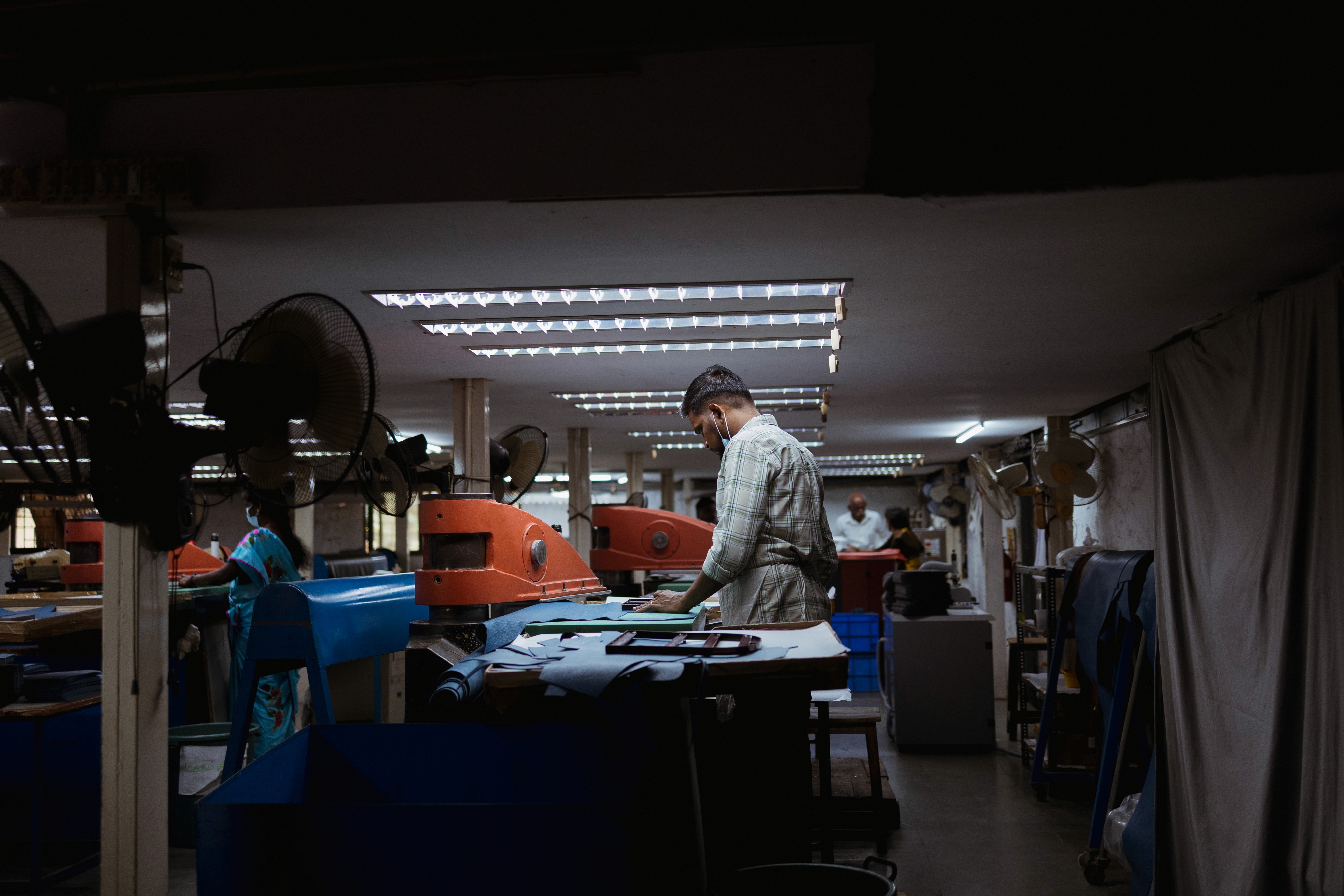 Leather artisan working in facility - Hero image