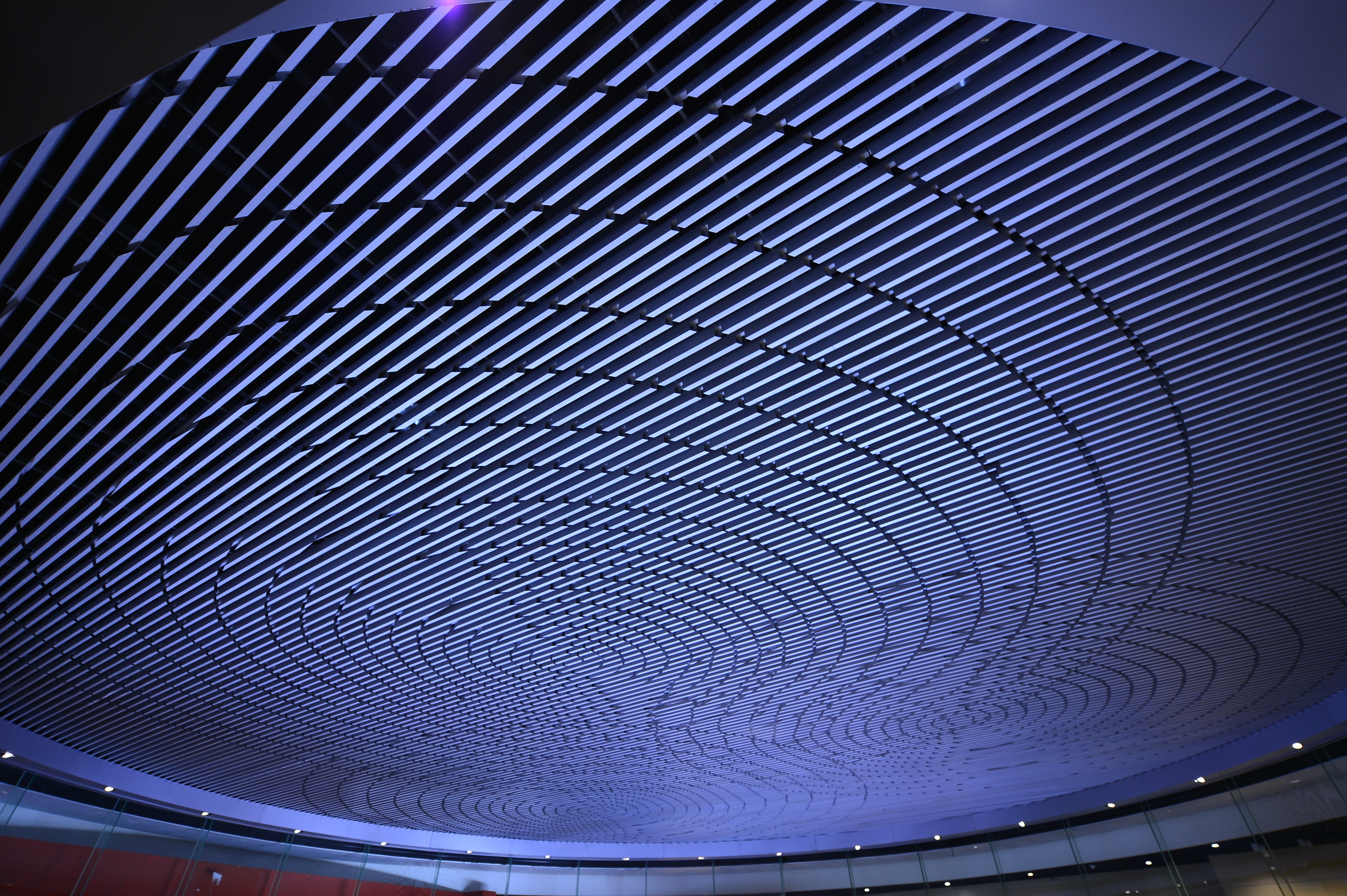 A classical hallway with tall arched windows and soft sunlight, representing clarity, structure, and fiduciary purpose.