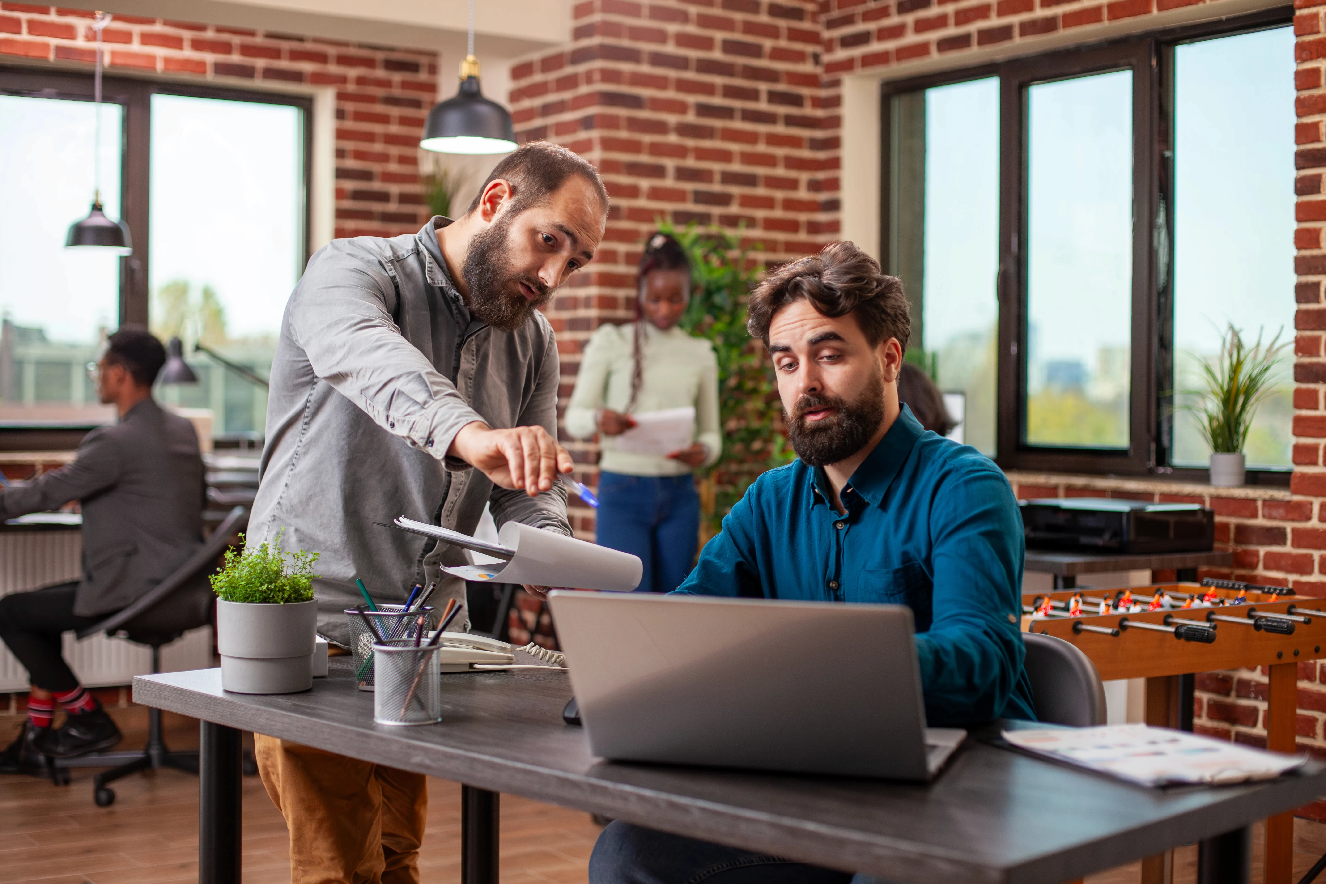 male-coworkers-review-startup-plan
