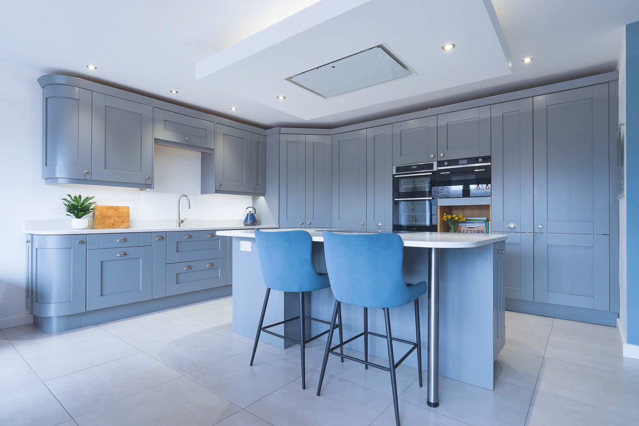 blue shaker kitchen with quartz worktops in chinley derbyshire