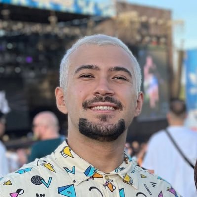 A portrait of a young man smiling