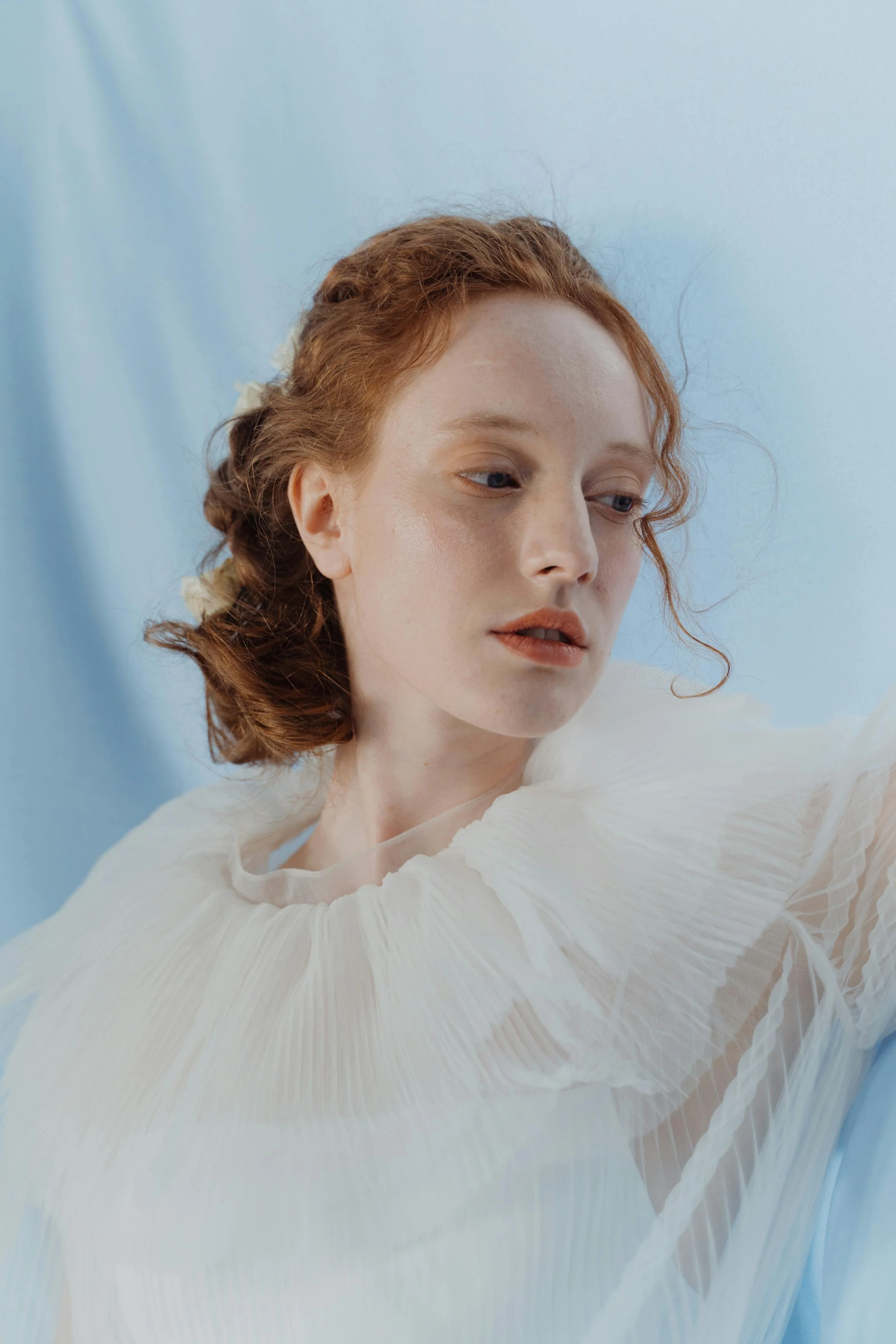 Soft Elegance: Studio Portraits in Light & Bloom