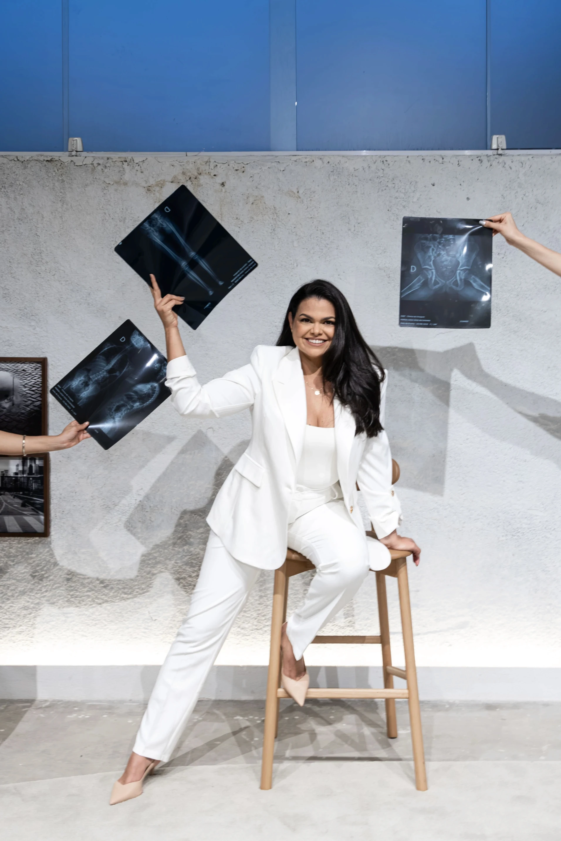 person sitting in a chair in front of a man