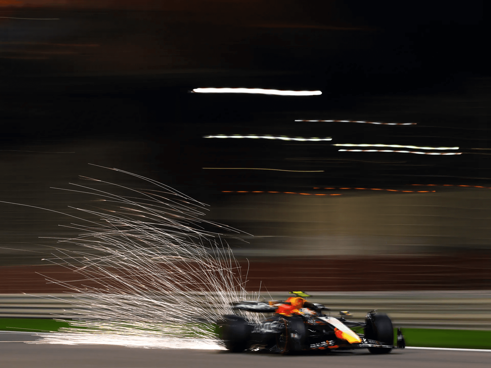 why do f1 cars spark, f1 car sparks explained, formula 1 sparks under car, why f1 cars spark at night, f1 skid blocks sparks, titanium skid blocks f1, f1 ground effect sparks, f1 plank and skid blocks, f1 ride height sparks, do f1 sparks mean damage, are f1 sparks dangerous, f1 night race sparks, singapore f1 sparks, f1 bottoming out sparks, fia skid block rules, how f1 aerodynamics work, f1 ground effect explained, modern f1 cars sparks, 2022 f1 ground effect sparks, formula 1 technical explained