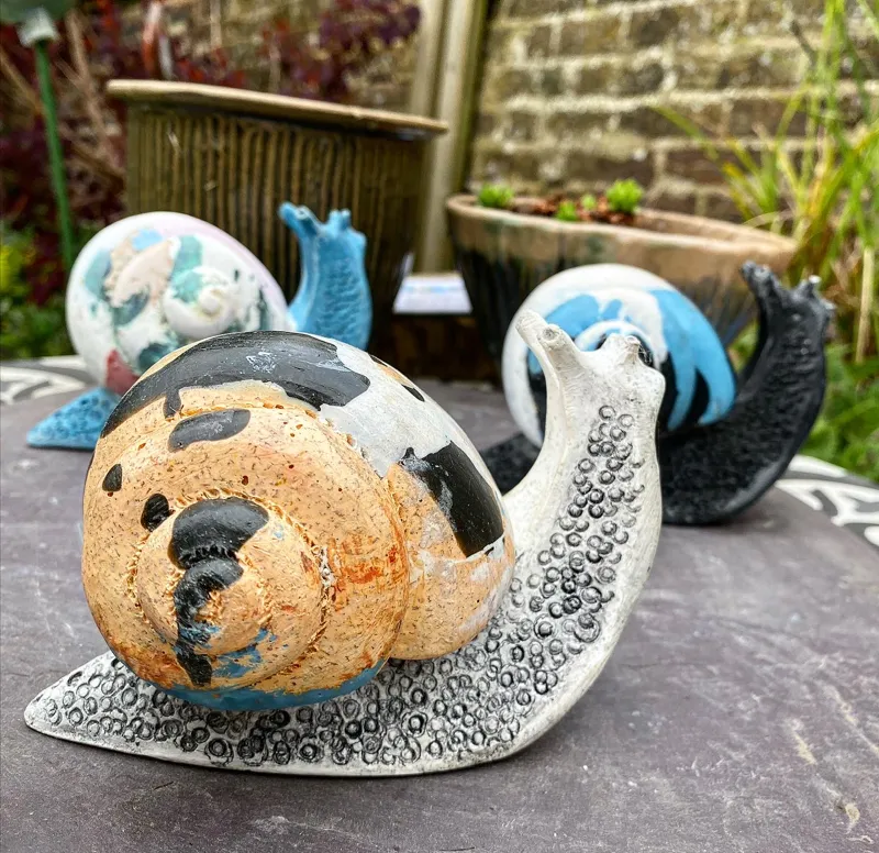 group of three snails  by Abby Martin