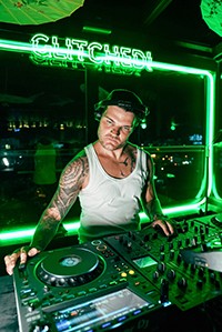 Colorful event posters featuring DJs and artists with vibrant graphic backgrounds