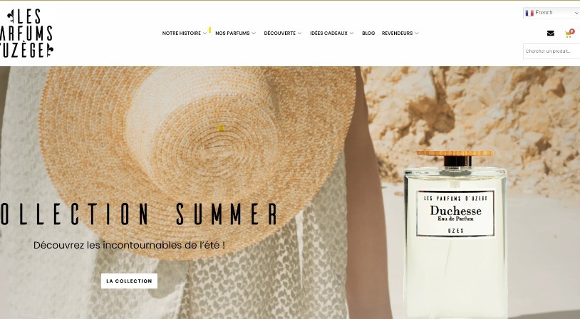Page d’accueil du site Les Parfums d’Uzège mettant en avant la collection été, illustrant la présence en ligne du client et son ambition de développement international.