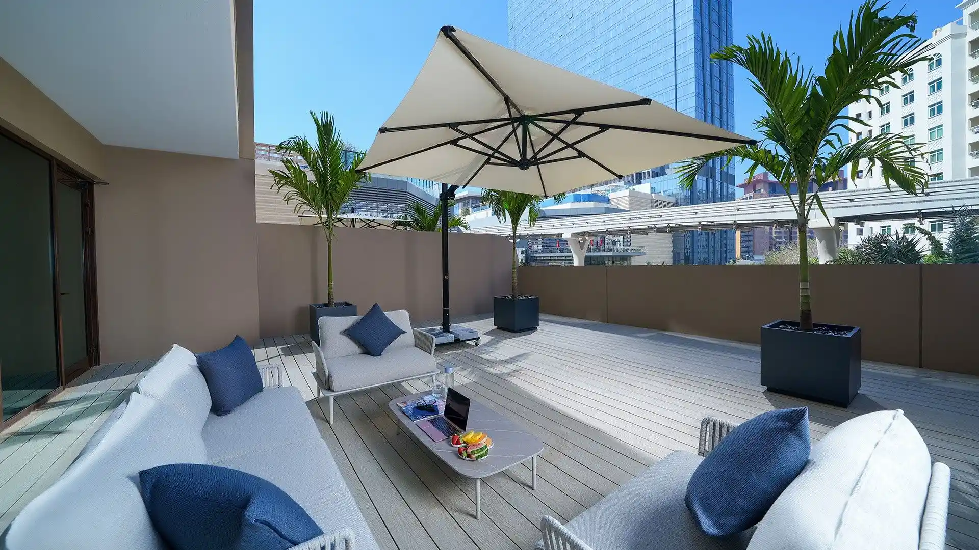 The outdoor terrace at Cheval Maison, a pet-friendly all-apartment hotel on Palm Jumeirah