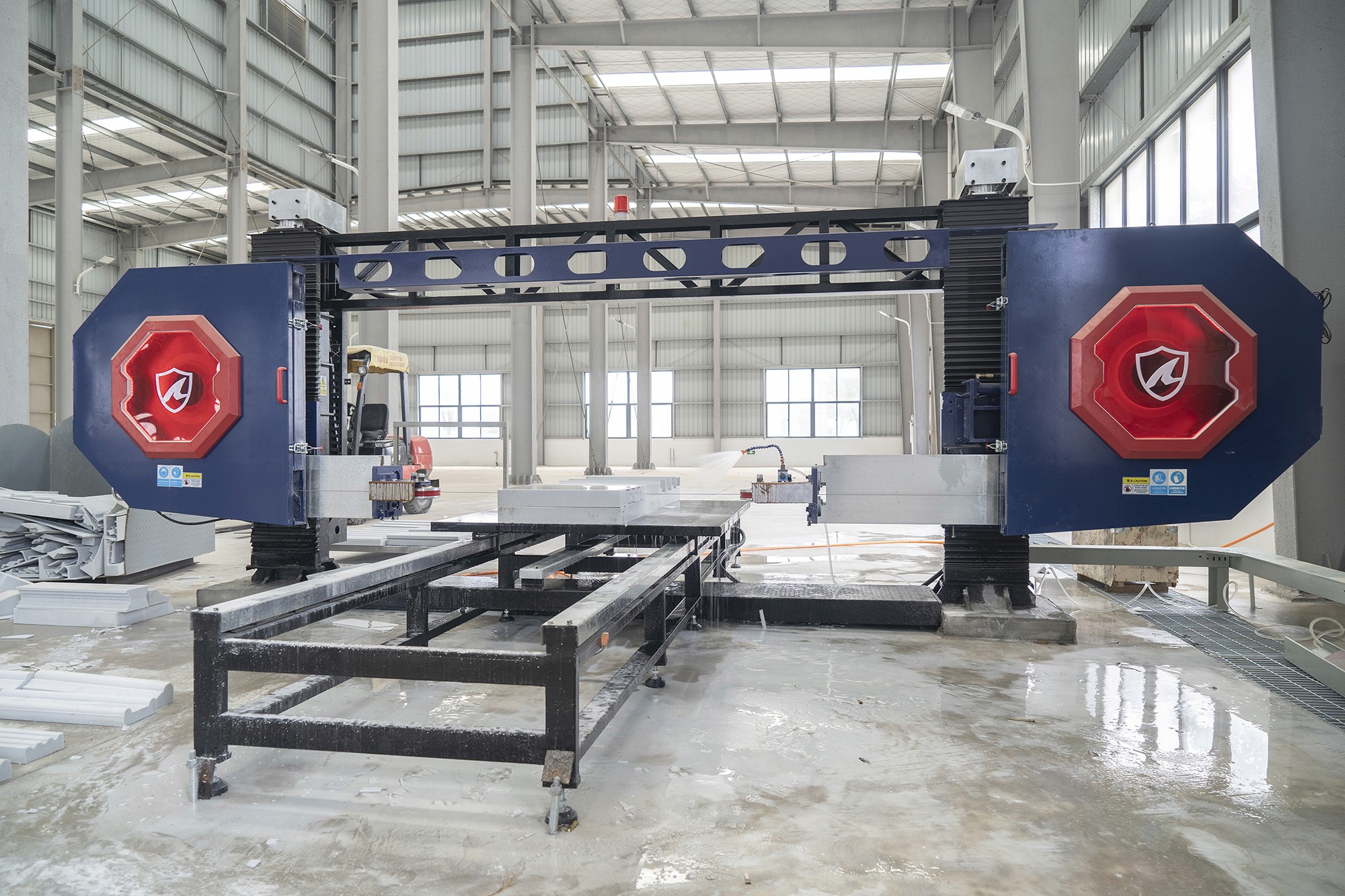 Close-up of the flywheel and wire saw assembly inside the CNC Wire Saw Machine, illustrating the mechanism that enables the machine to produce intricate and precise cuts on foam ceramics.