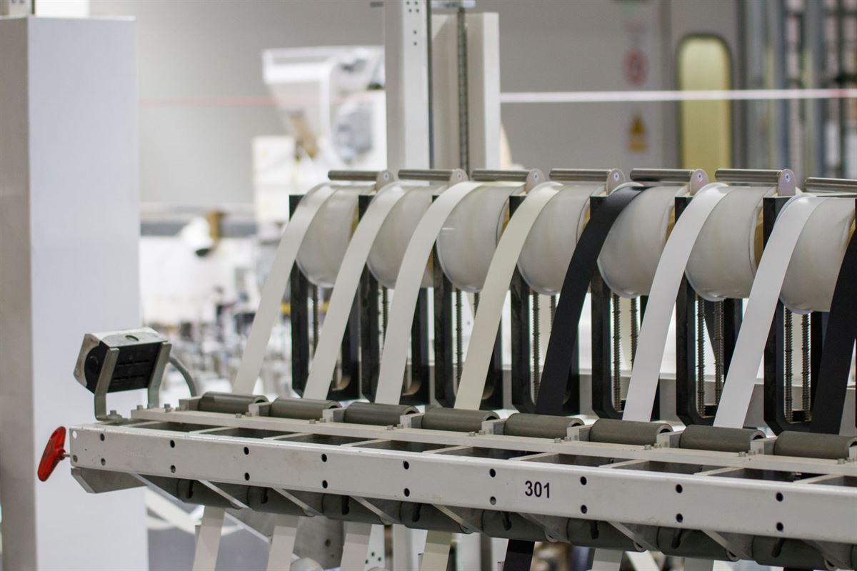 Automated machinery inside a modern manufacturing facility