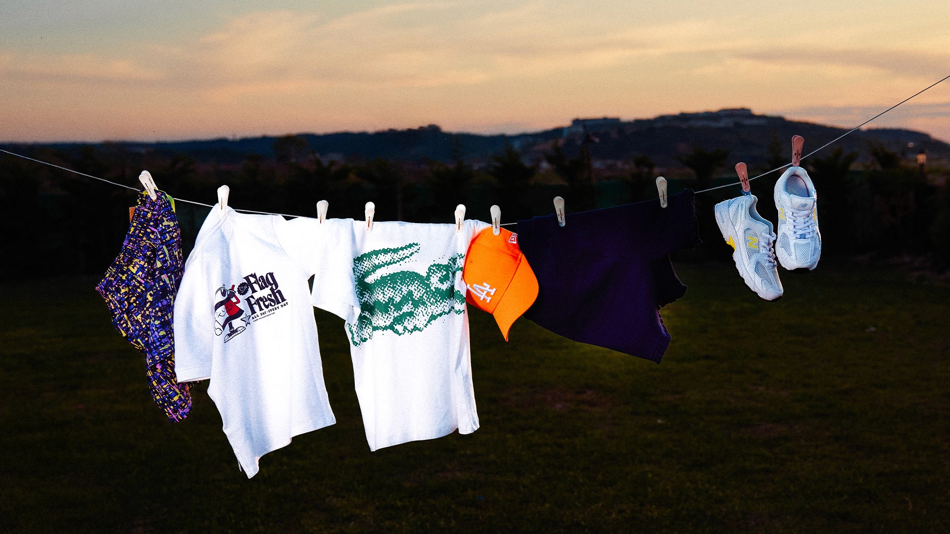 Streetside billboard with flyposters of the Batch.Works brand and illustrations