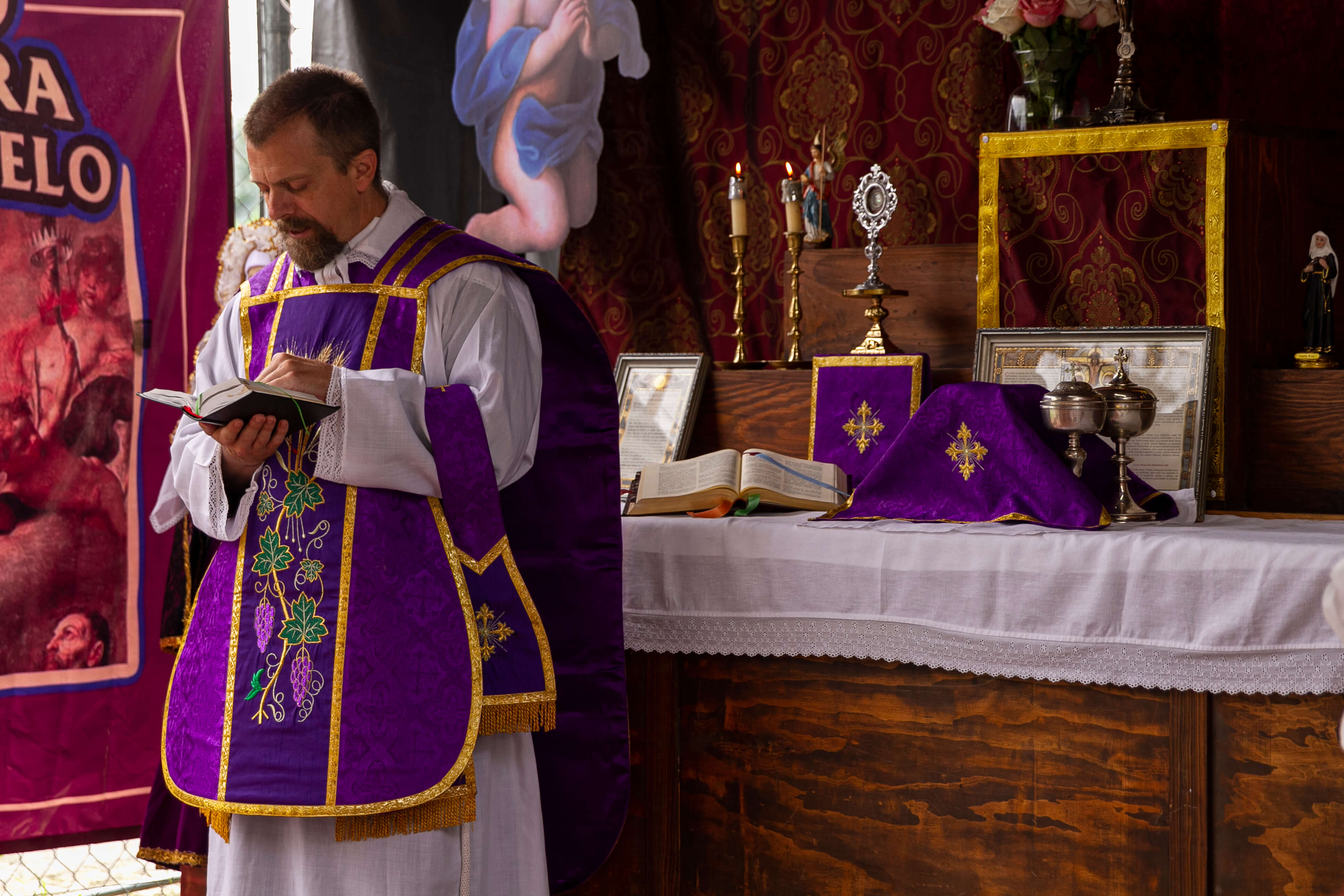 a group of children sitting on steps in front of a building