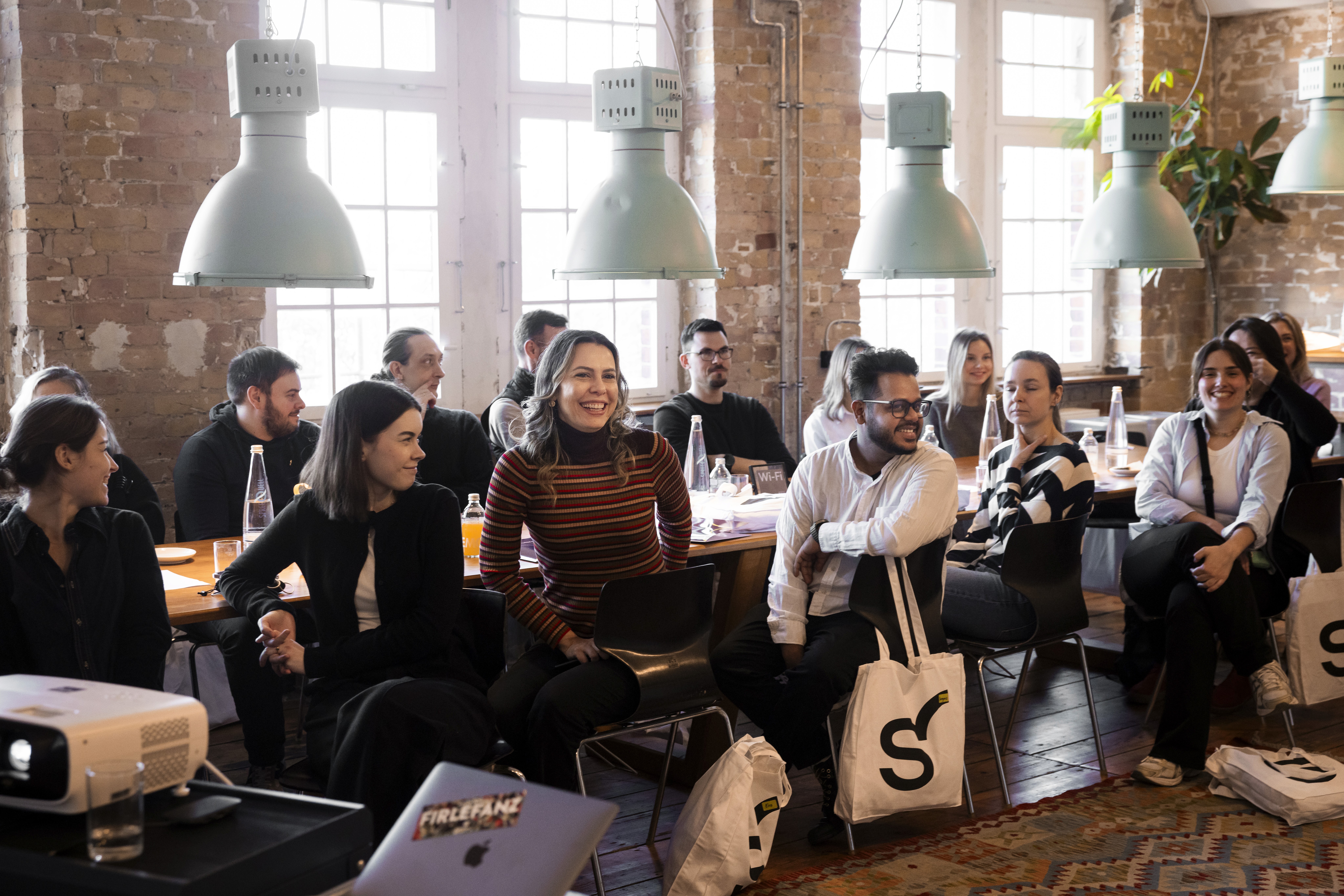 man in blue dress shirt and woman in black long sleeve shirt