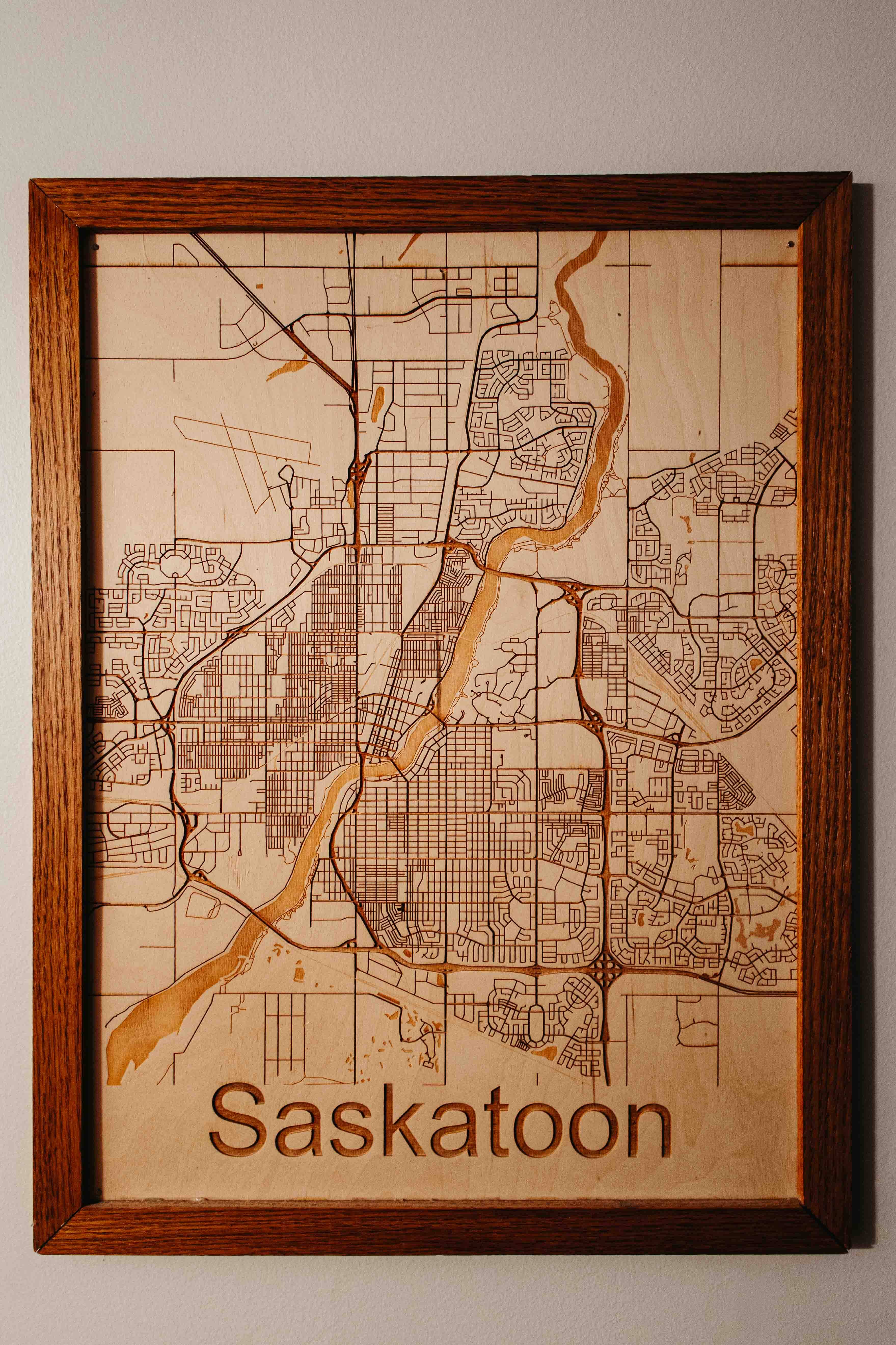 A custome woodwork framed map of Saskatoon