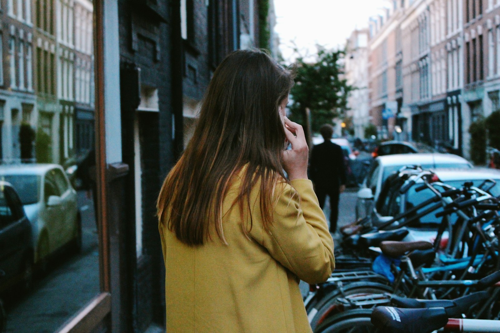 Field rep on a voice call while walking to the next visit
