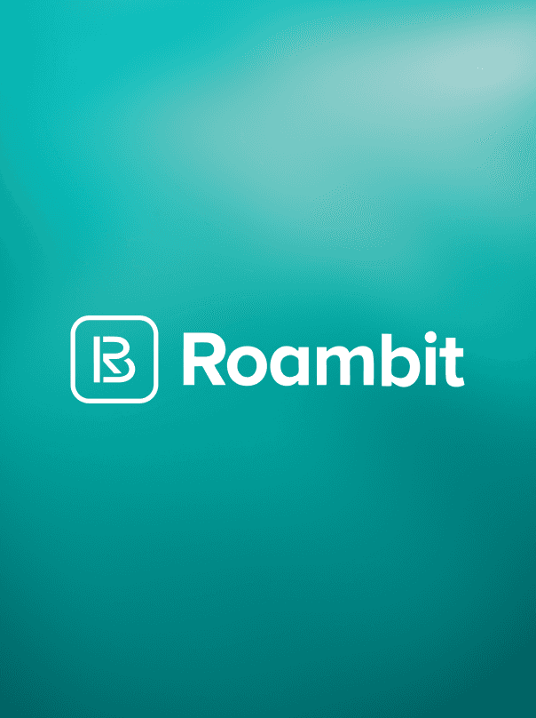 A man with glasses and a brown shirt, crossing his arms.