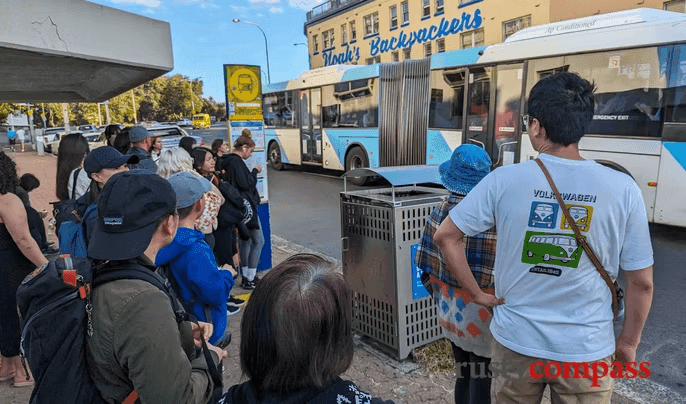 Massive crowd waiting for bus