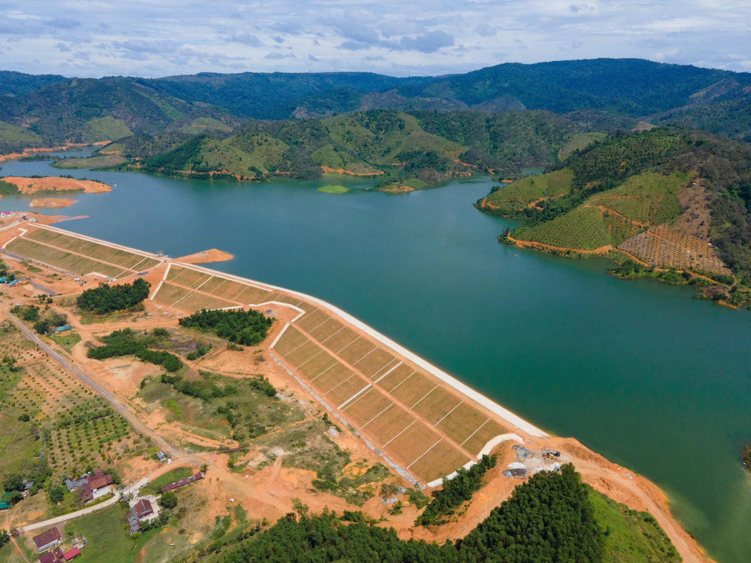 Road paving machine laying asphalt on a street.