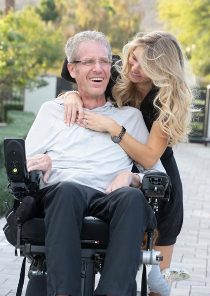 Eric Weinbrenner with his wife.