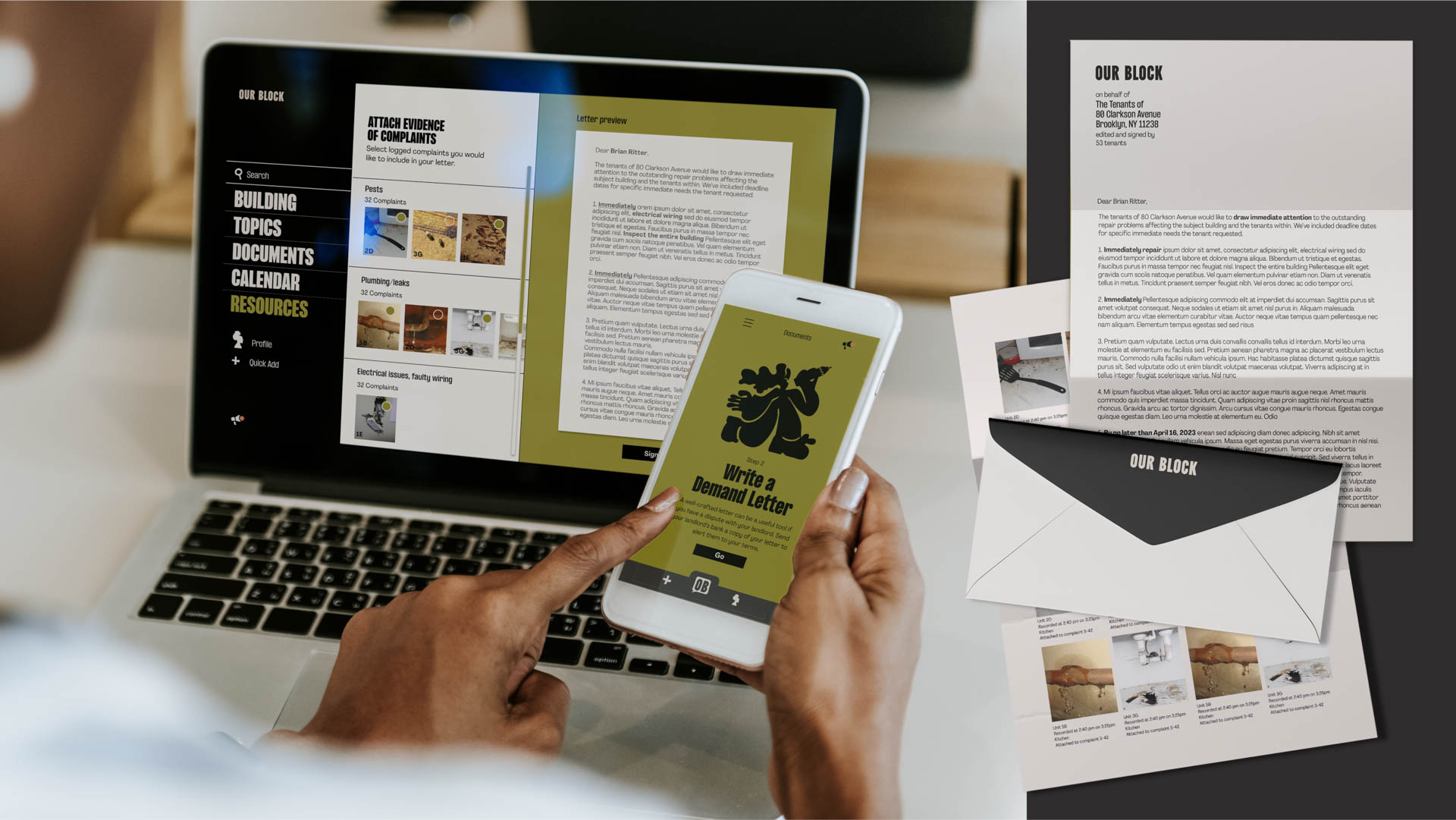 A person holds a smartphone displaying a green screen titled “Write a Demand Letter,” with a black silhouette of a bear at the top. Beside it, a laptop screen shows “Attach Evidence of Complaints” and lists “Pests,” “Counters,” “Plansets,” and “Resource” sections. A white envelope labeled “OUR BLOCK” lies nearby, with additional documents and images visible in the background.