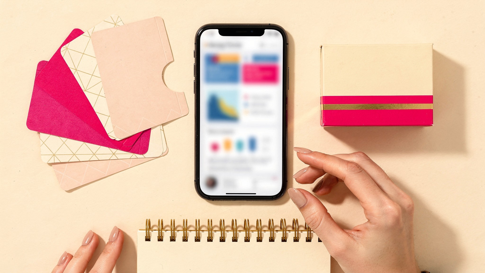 Pink flat lay of Instagram theme page monetization tools and a phone showing an affiliate dashboard