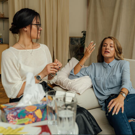 Two woman talking to each other