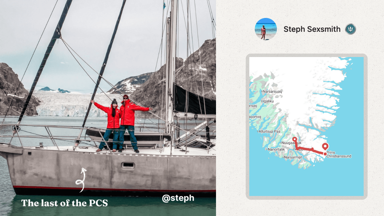 Two people on a sailboat in front of scattered ice