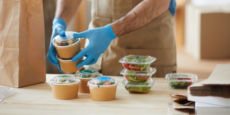 A Malaysian business owner packing an order