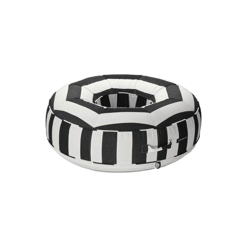 Luxury ring pool float in black-and-white stripe canvas with progressive shading and matte white base