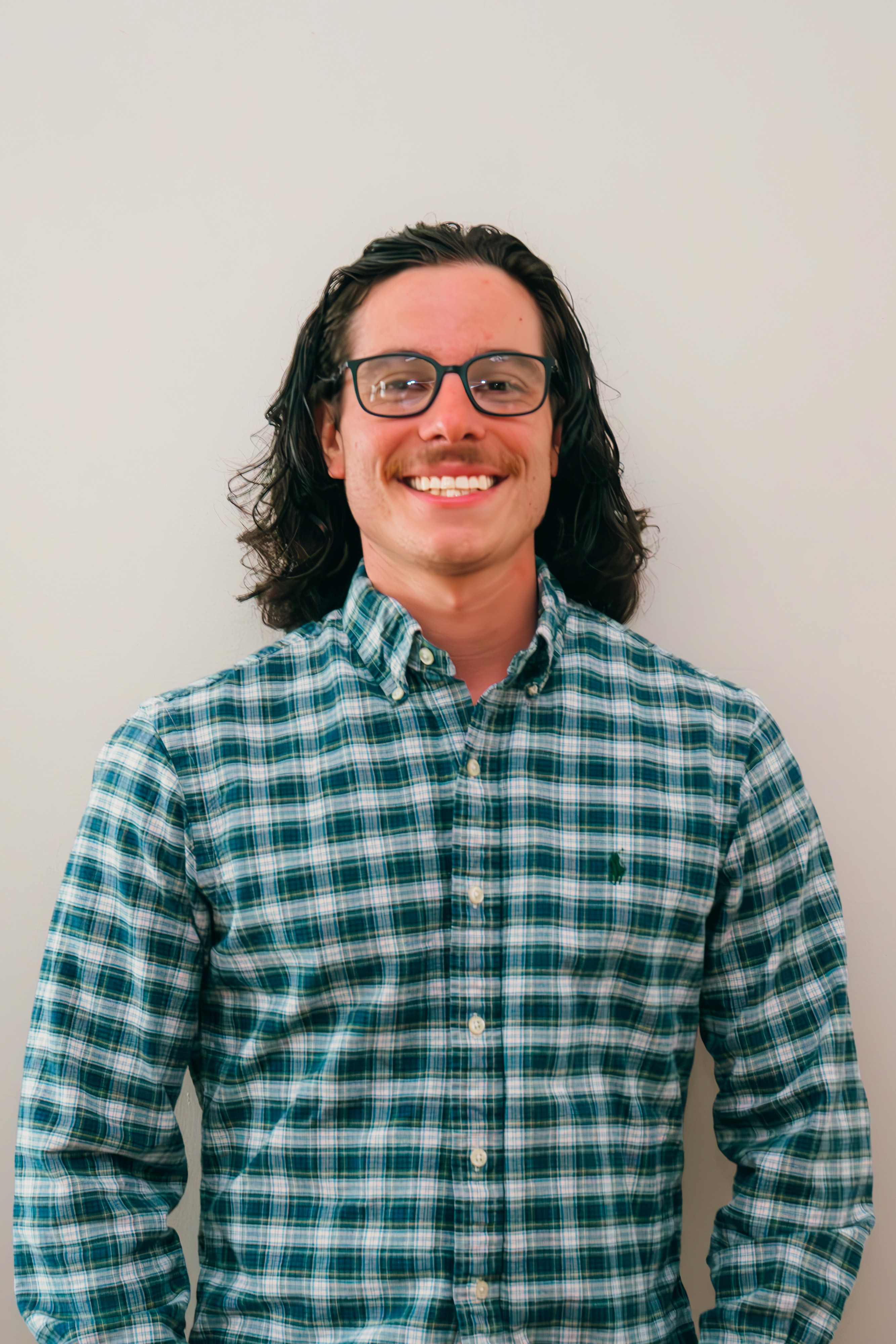 woman in white crew neck shirt smiling