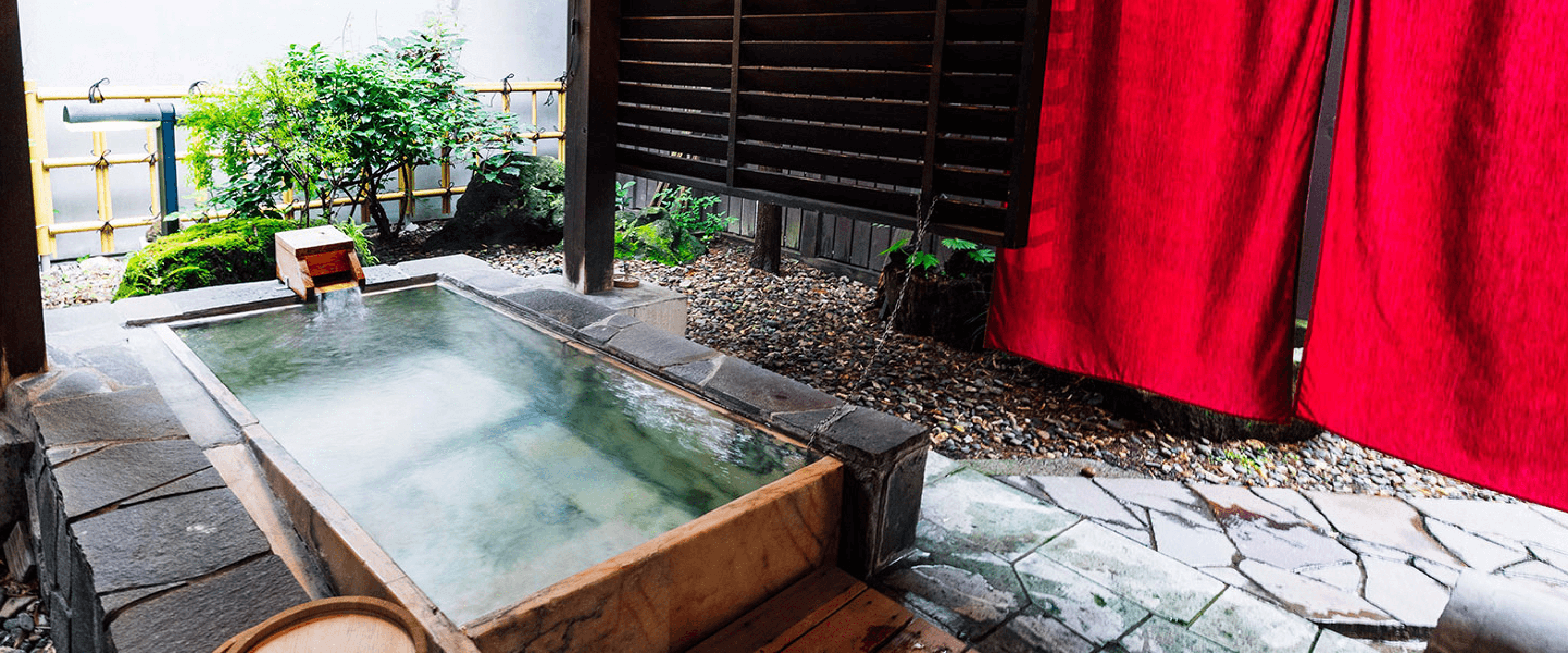 Private hot spring bath in a garden